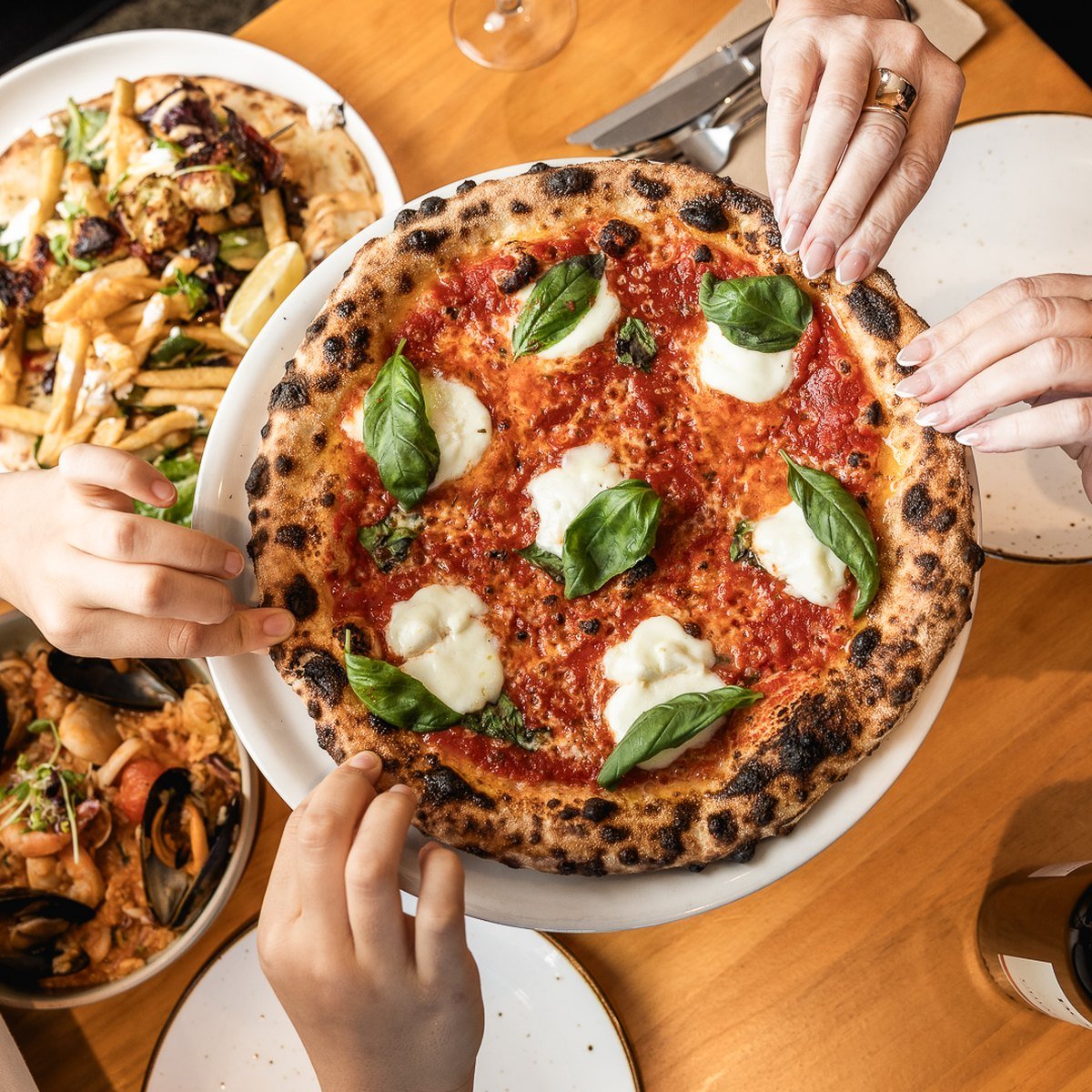 Woodfired margherita pizza to share at Belliney's Ristorante & Bar, Ryde